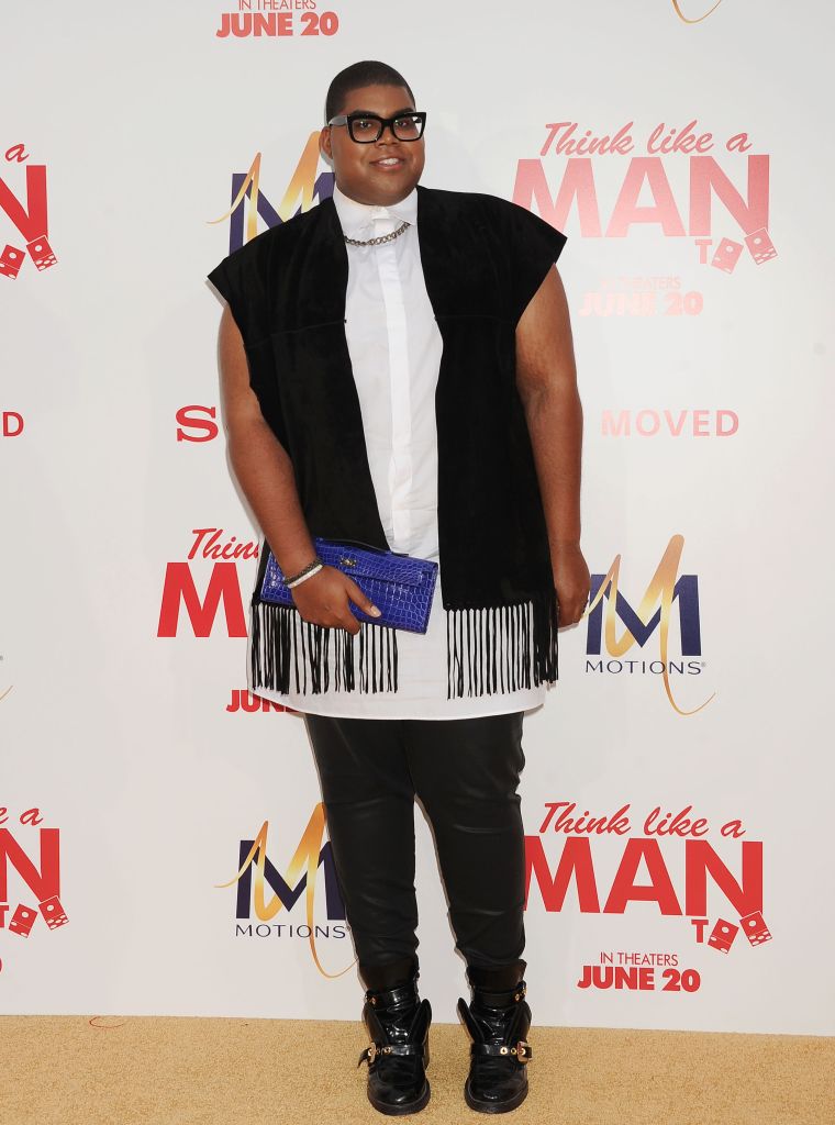 Then: Regardless of his weight, EJ never failed to dress to impress.