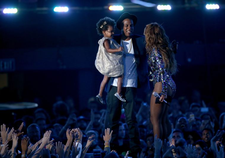 Supporting mommy, natural hair and all.