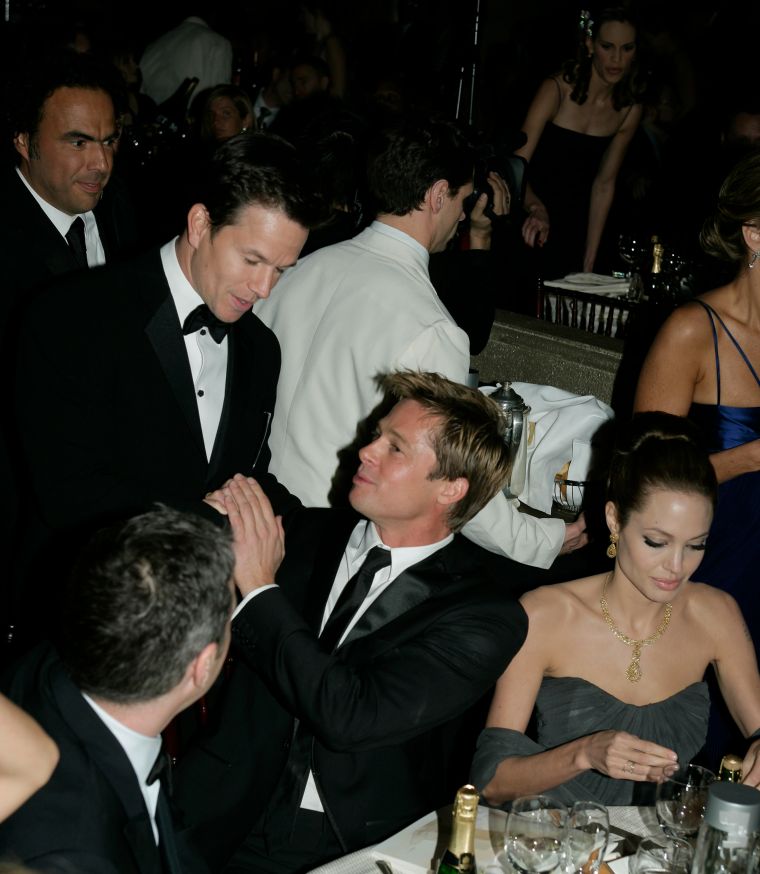 Mark Walhberg greeted Brad and Angelina at their table.