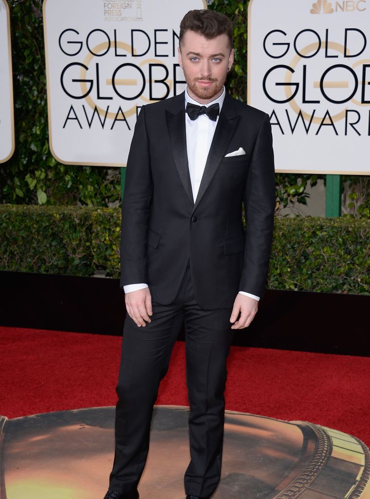 Sam Smith suited up in style for the big occasion.