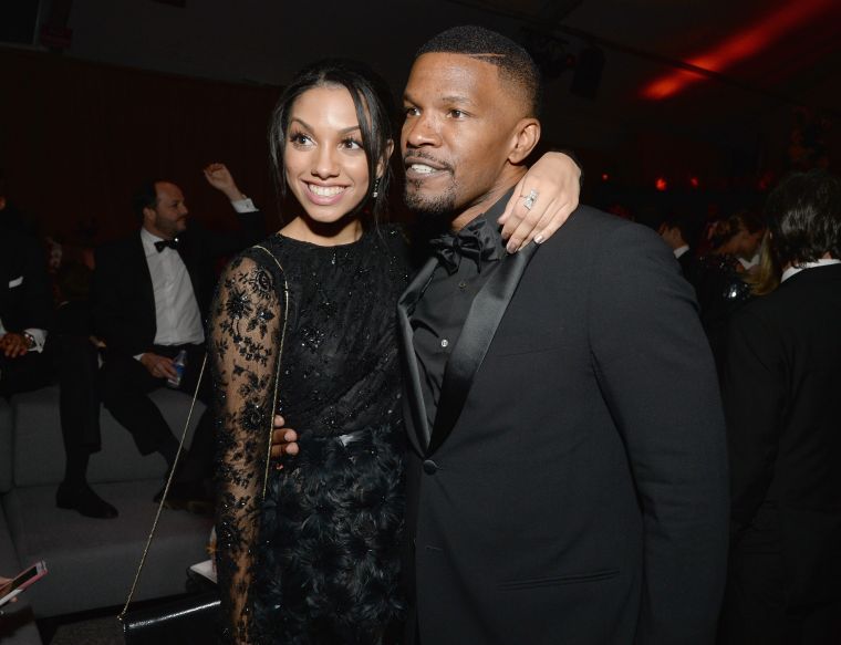 Corinne and Jamie Foxx give one last hug at an after party for the 2016 Golden Globe Awards in Beverly Hills.