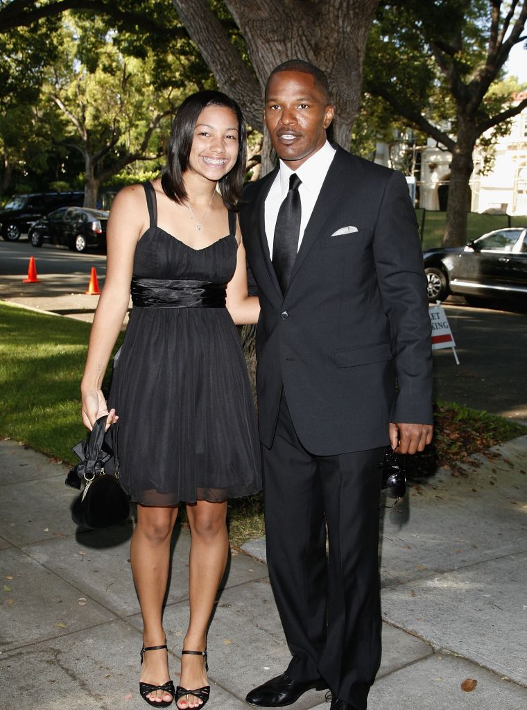 Corinne gets to rub shoulders with Barack Obama at the 'Black And White' Gala for the Barack Obama campaign held at a private residence on August 21, 2008.