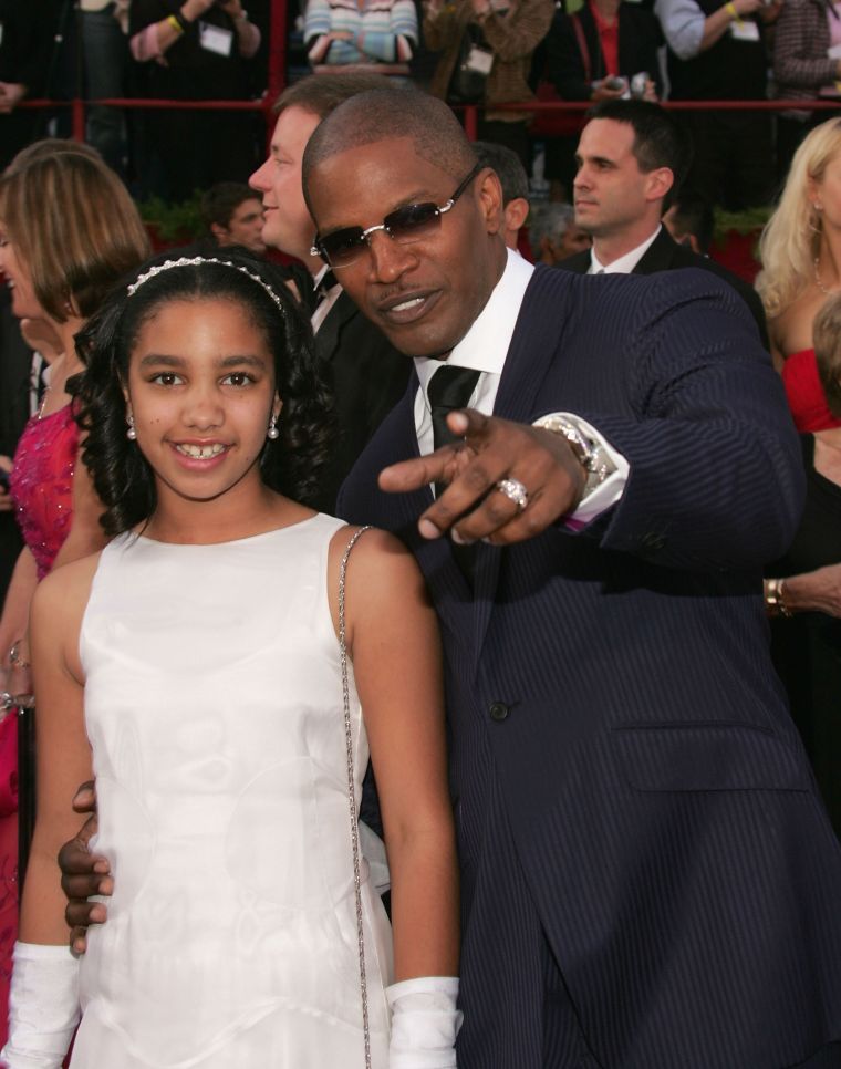 Point to the camera, Jamie. Jamie Foxx was nominated for Best Actor in a Supporting Role for his performance in 'Collateral' and for Best Actor in a Leading Role for his performance in 'Ray' and arrives at the Oscars with his daughter Corinne.