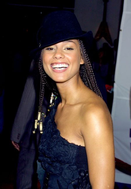 Alicia accessorized her signature look with countless hats…