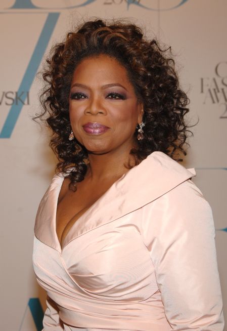 Tamed golden curls are her go-to look.