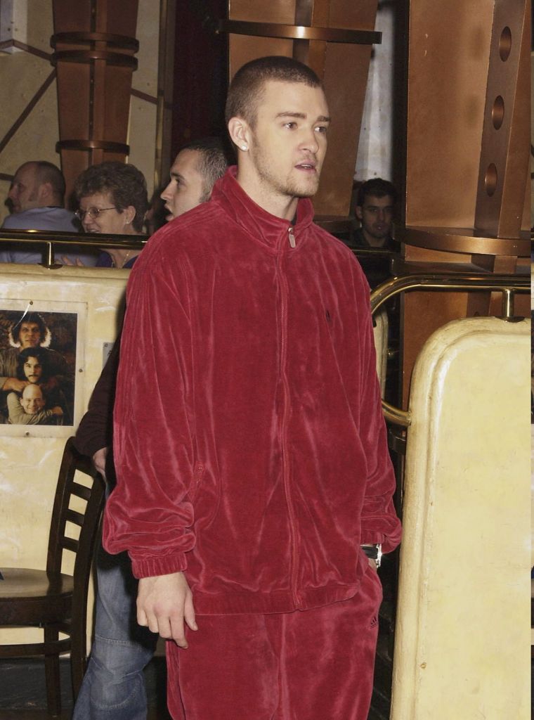 Stunting in a velour tracksuit.