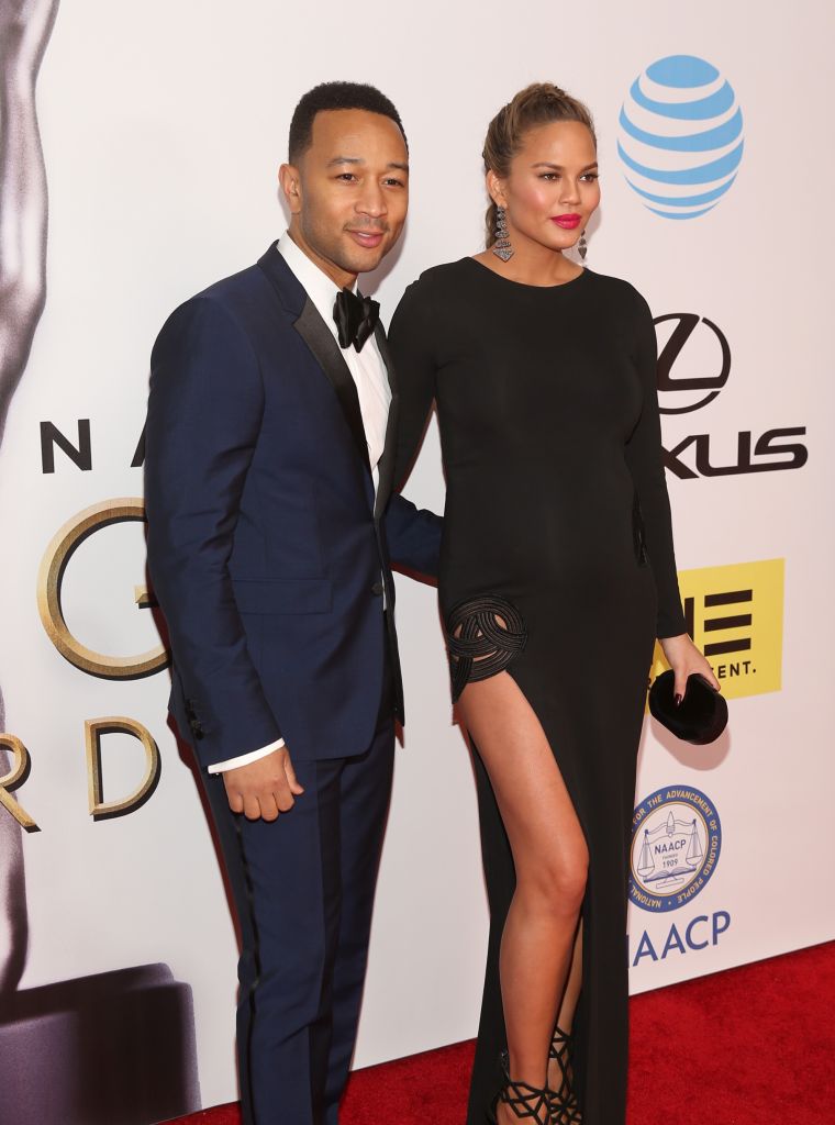 John Legend accompanies Chrissy on the red carpet.
