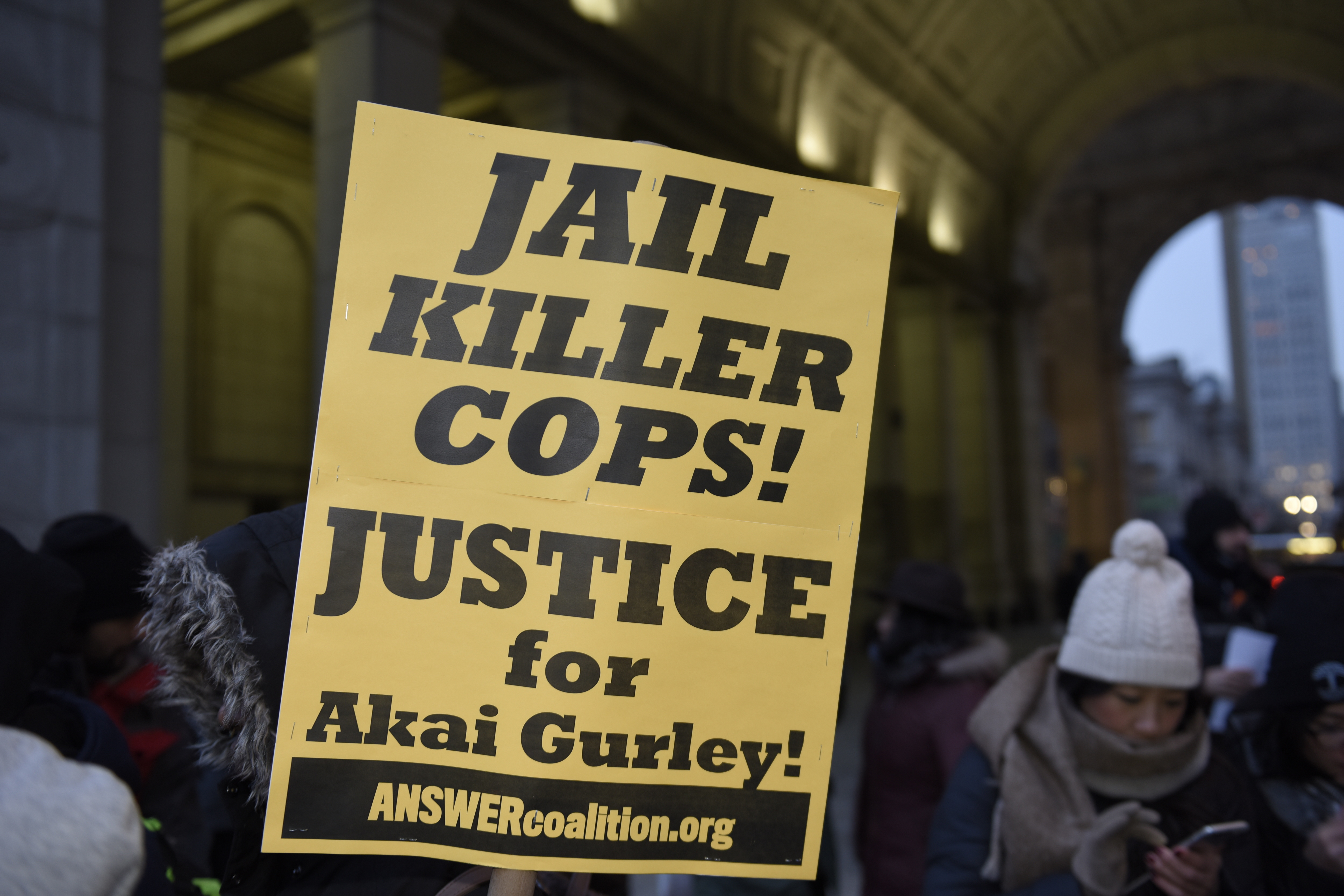 Jail Killer Cops sign at One Police Plaza. Several dozen...