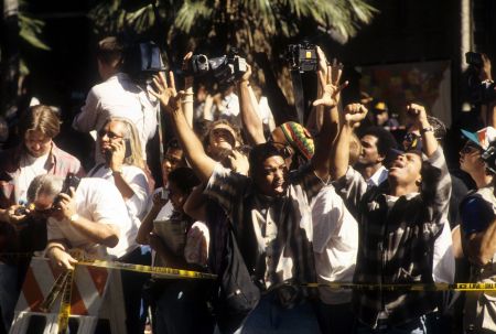 The crowd cheers after hearing the verdict on October 3rd, 1995.