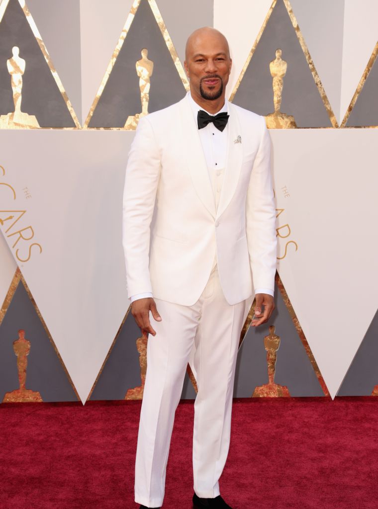 Common looks too smooth in an all-white tuxedo.