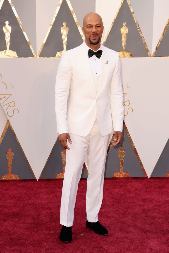 Common looks too smooth in an all-white tuxedo.