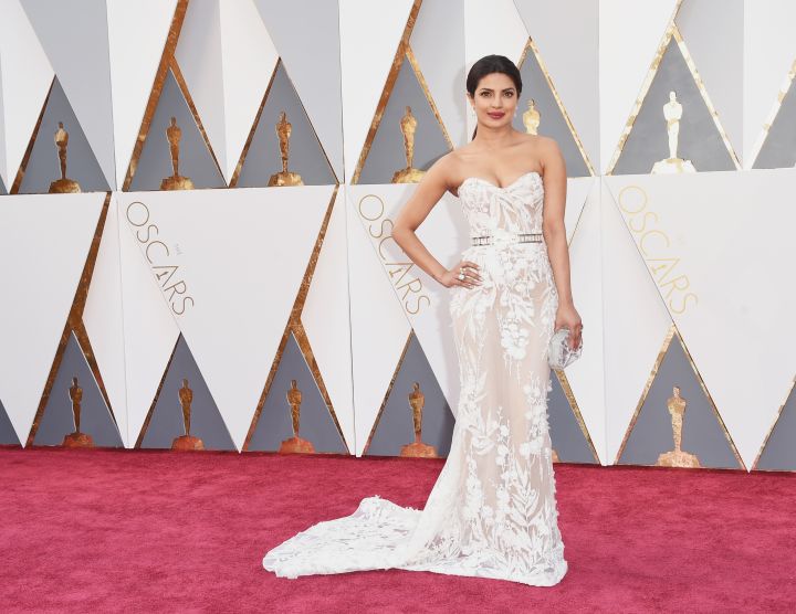 S T U N N I N G. Priyanka Chopra in a sheer, white gown.