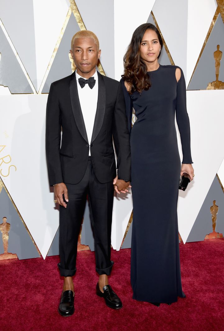Pharrell’s still rocking blonde hair. He arrived with his wife, Helen.