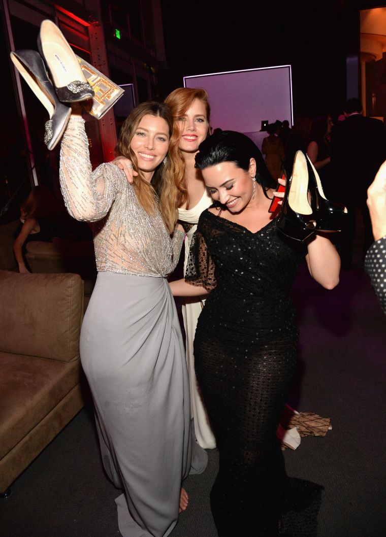 Jessica Biel, Amy Adams, and Demi Lovato got a little ratchet at the 2016 Vanity Fair Oscar Party by taking their shoes off and enjoying themselves.