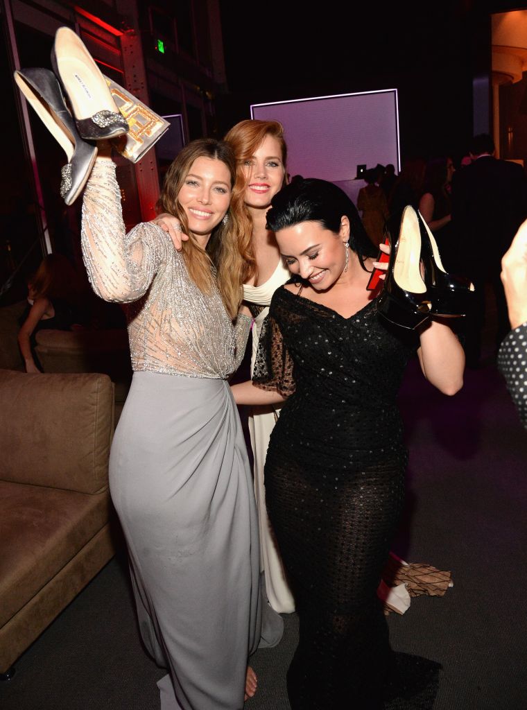 Jessica Biel, Amy Adams, and Demi Lovato got a little ratchet at the 2016 Vanity Fair Oscar Party by taking their shoes off and enjoying themselves.