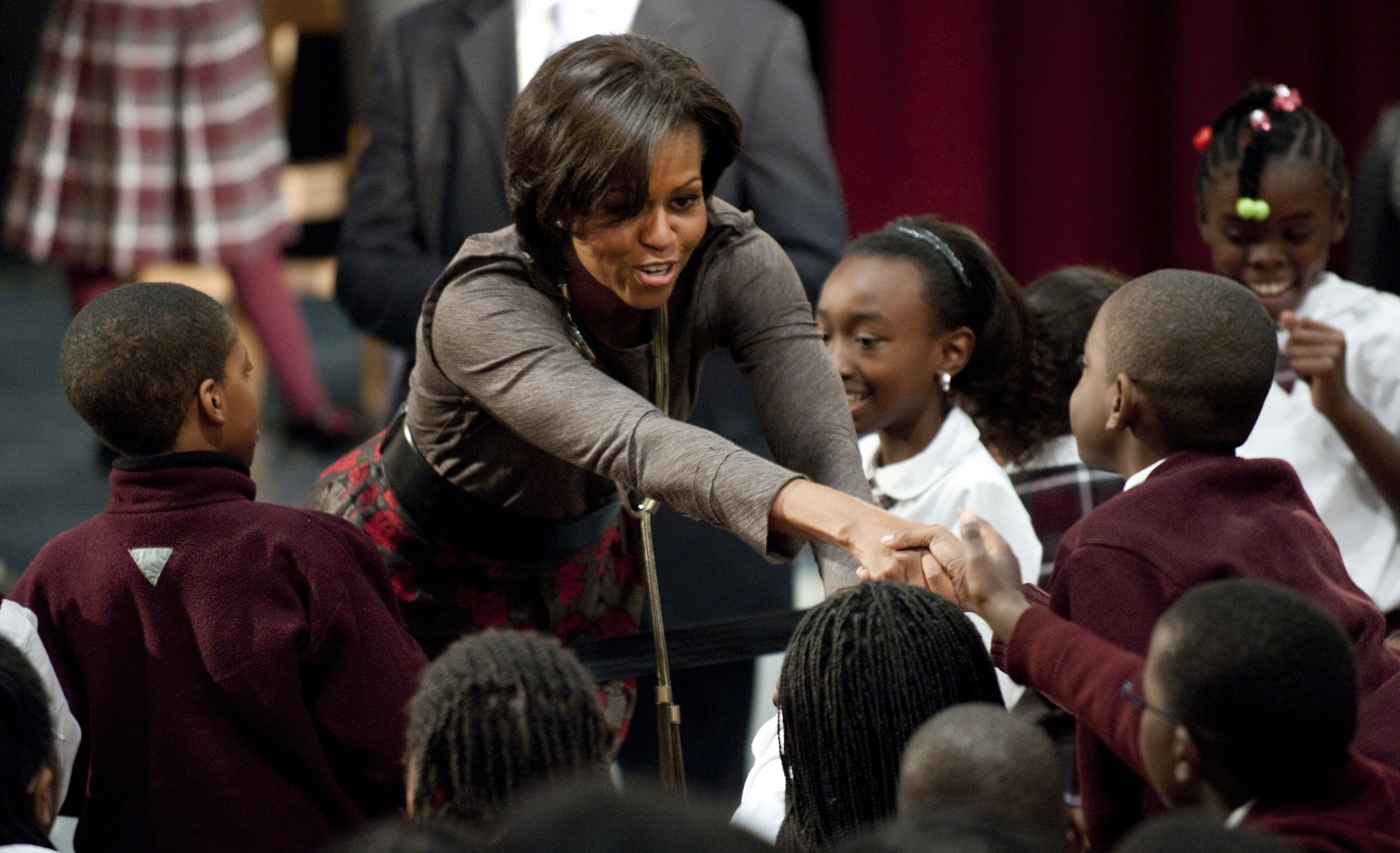 US First Lady Michelle Obama greets a st