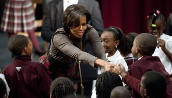US First Lady Michelle Obama greets a st