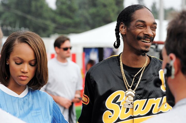 Tyra Banks and Snoop Dogg during 1998’s MTV Rock n’ Jock Baseball in Los Angeles.