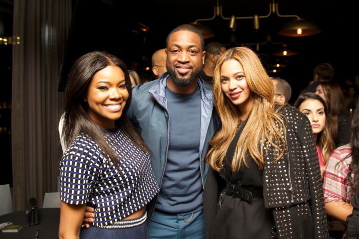 Bey leans in close for a pic with Gabrielle Union and Dwyane Wade.