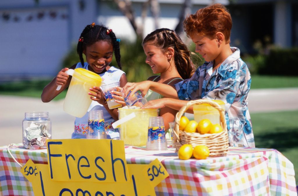 Children Selling Lemonade at Lemonade Stand