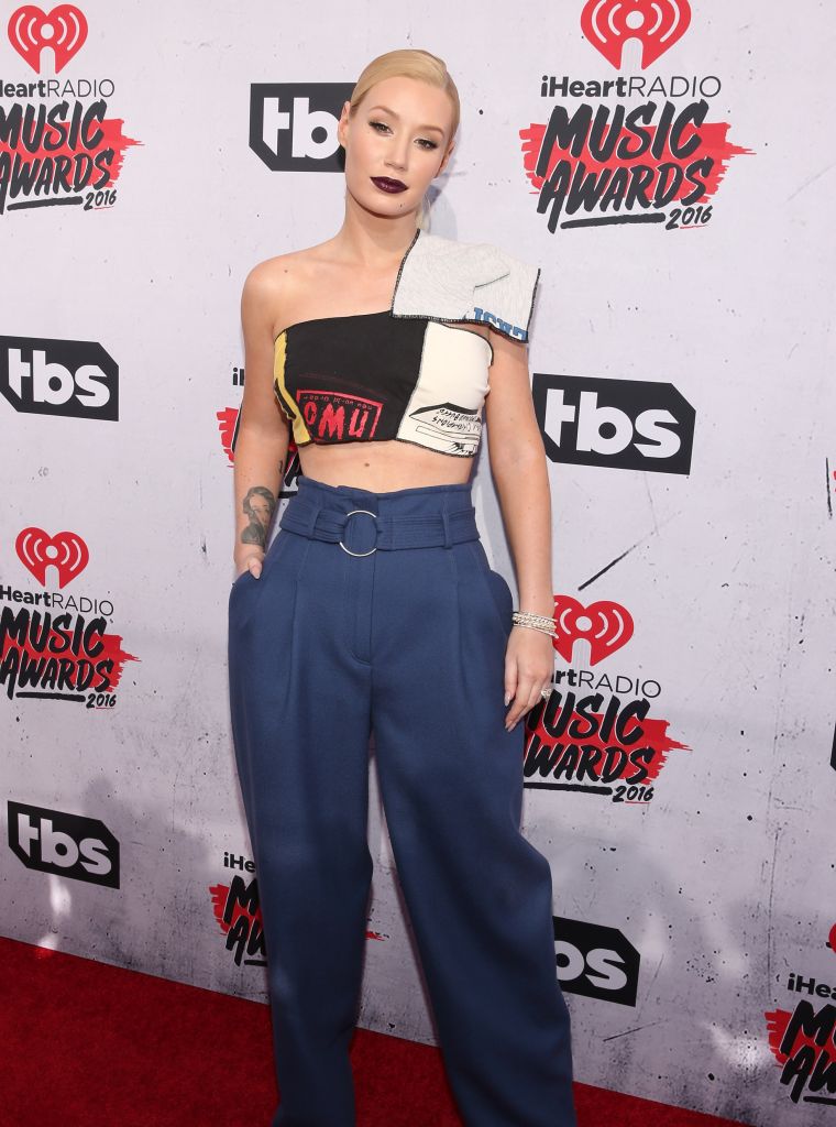 Iggy Azalea confirmed she's still engaged to Nick Young despite cheating rumors by wearing her engagement ring for the evening.