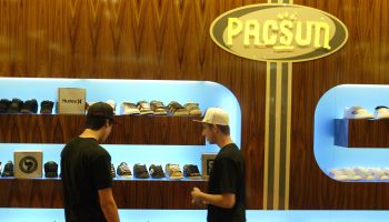 Shoppers look over the shoe department at the new Pacsun store at the Galleria in Riverside. Pacifi