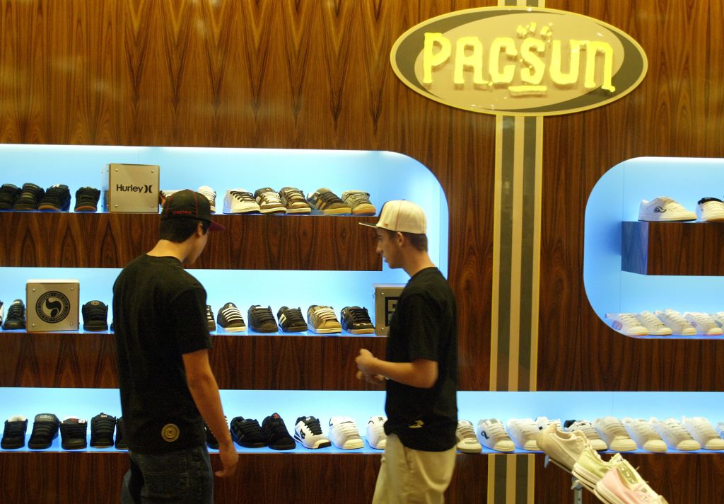 Shoppers look over the shoe department at the new Pacsun store at the Galleria in Riverside. Pacifi