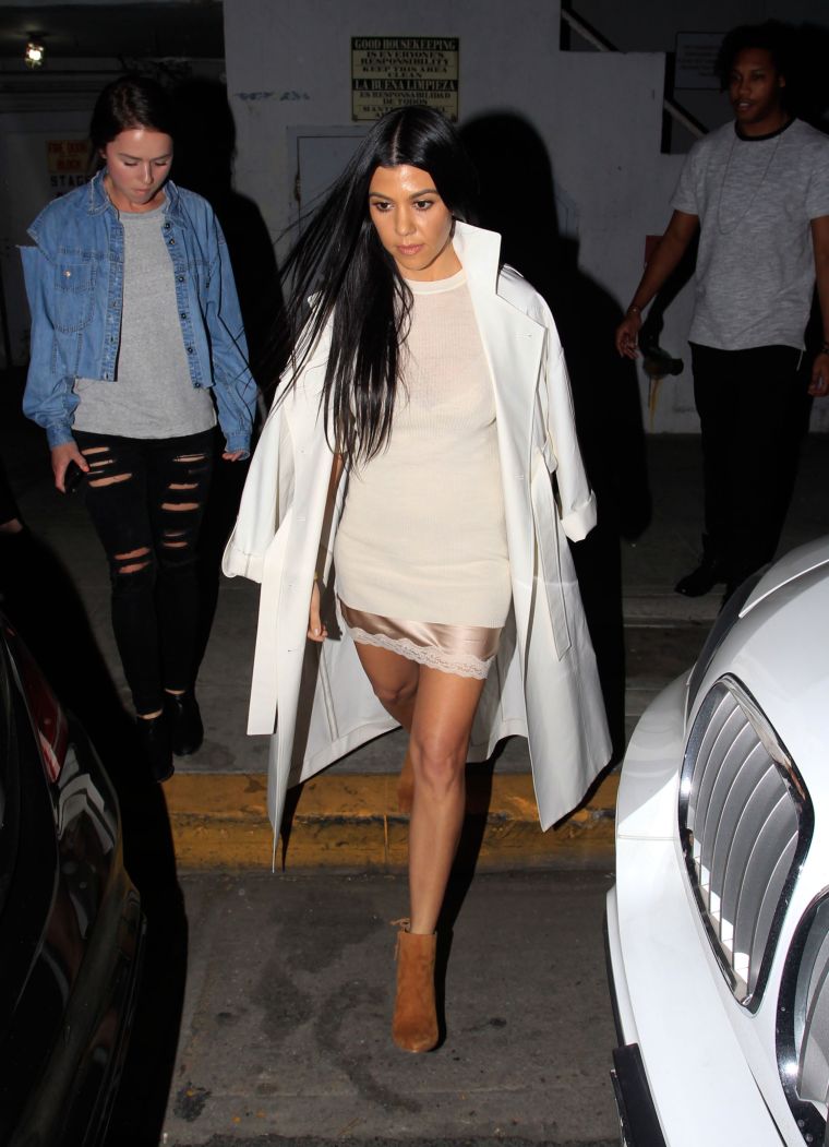 Kourtney in all white.