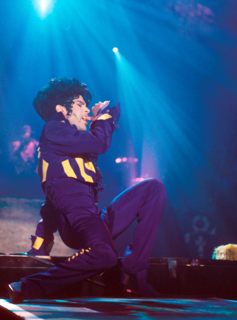 Prince performs on stage, London, 1993.
