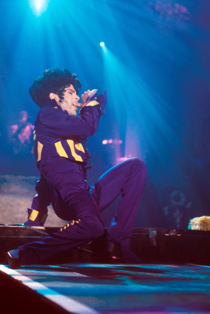 Prince performs on stage, London, 1993.