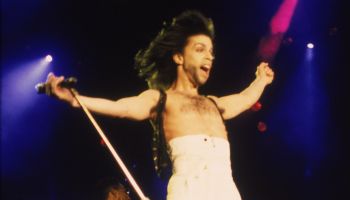 Prince In Concert With Arms Outstretched