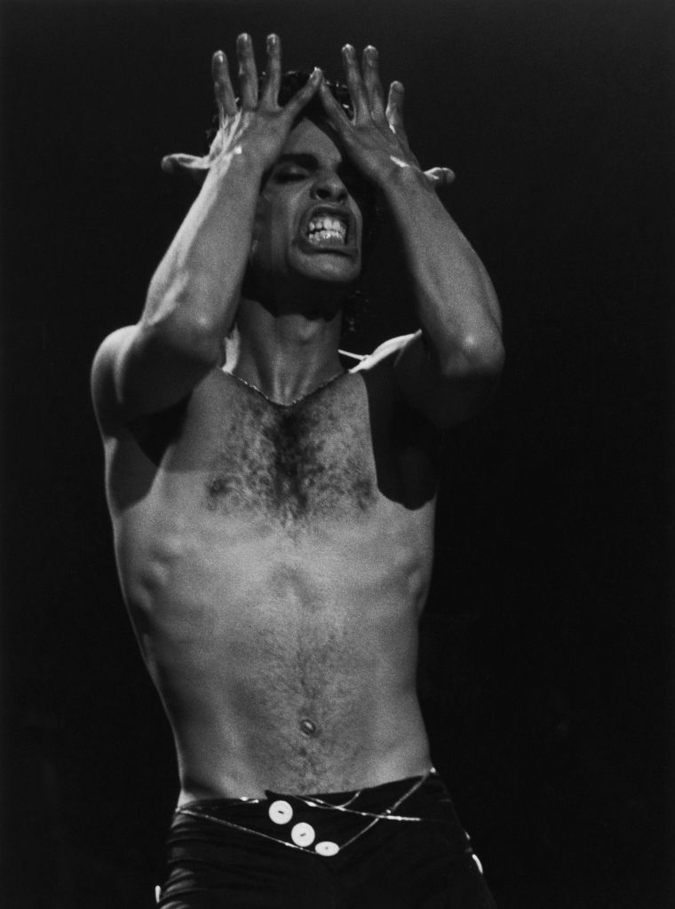 American singer-songwriter Prince performing on stage, 1986.