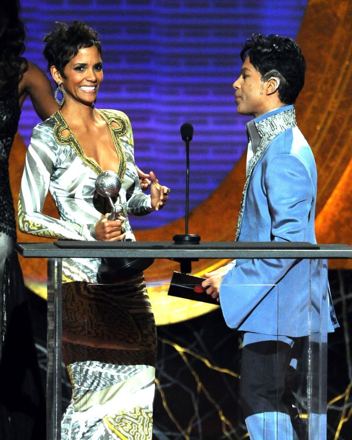 Prince presents an award to Halle Berry 42nd Annual NAACP Image Awards
