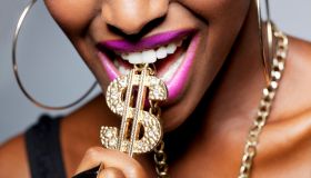 Close Up of Woman's Mouth with Dollar