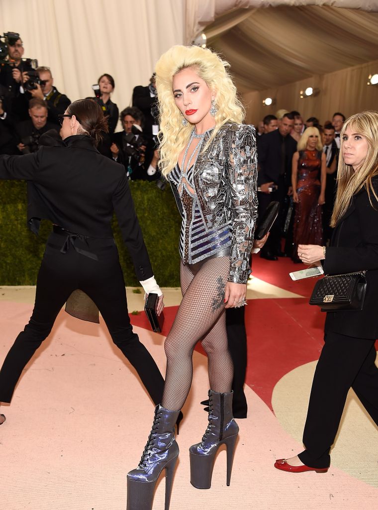Lady Gaga goes for a bold look in sky-high boots.