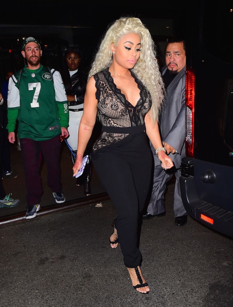 Blac Chyna steps out in a semi-sheer black jumpsuit.