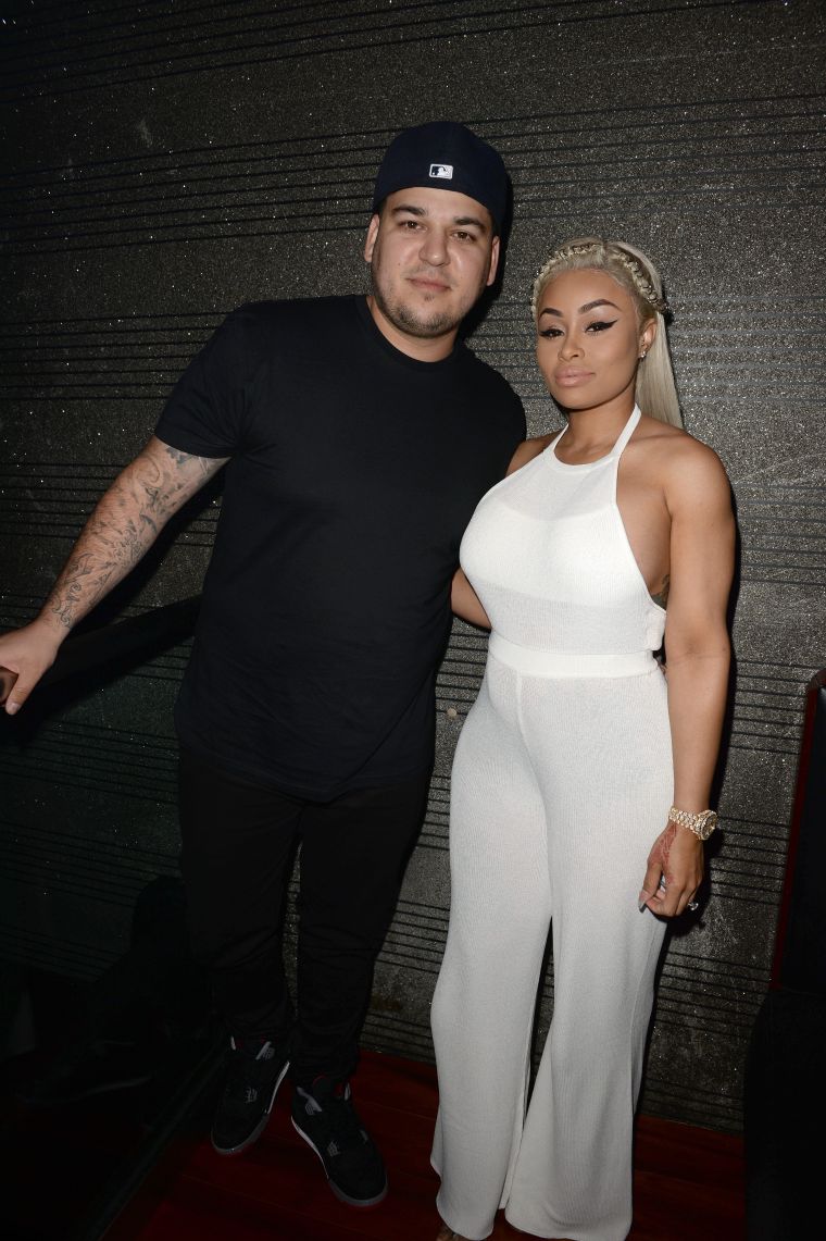 We first spotted a hint of a baby bump when Chyna donned a white jumpsuit for a night out with Rob.