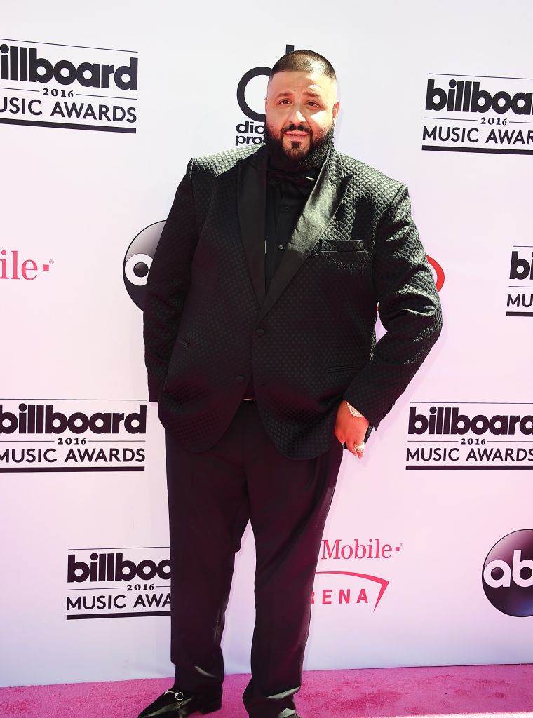 Snapchat king DJ Khaled suited up in all black.