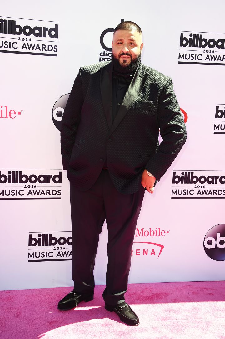 Snapchat king DJ Khaled suited up in all black.