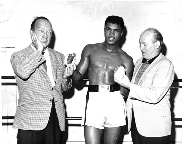 Cassius Clay poses with Maxie Rosenbloom and Solly Krieger