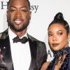 12 Photos Of Dwyane Wade And Gabrielle Union Fiercely Supporting Their Kids
