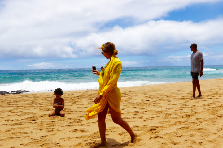 Mama Bey catches an adorable moment on her iPhone.