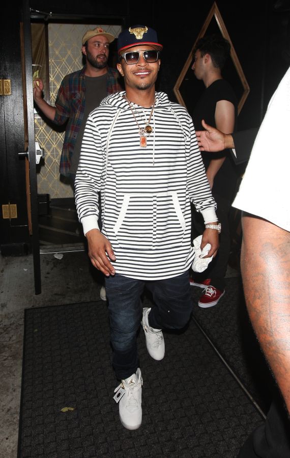 Rapper T.I. parties at Bootsy Bellows nightclub
