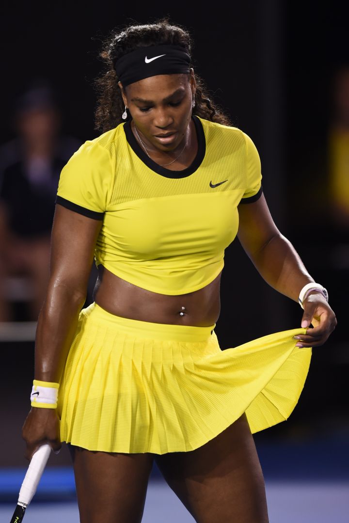 Serena wears a yellow crop top at the 2016 Australian Open.