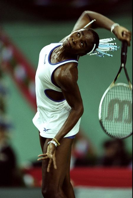 Venus rocks a cutout tennis dress at the 1999 Grand Slam Cup