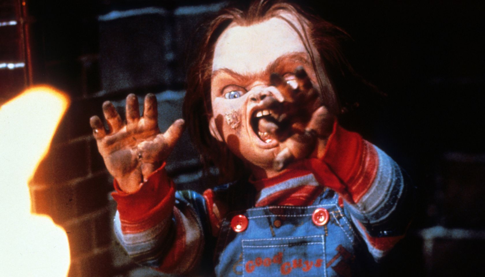 Chucky Near Flames In 'Child's Play'