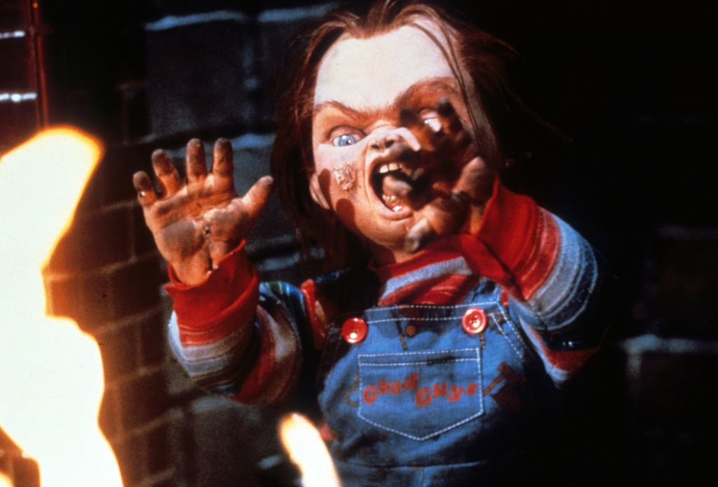 Chucky Near Flames In 'Child's Play'