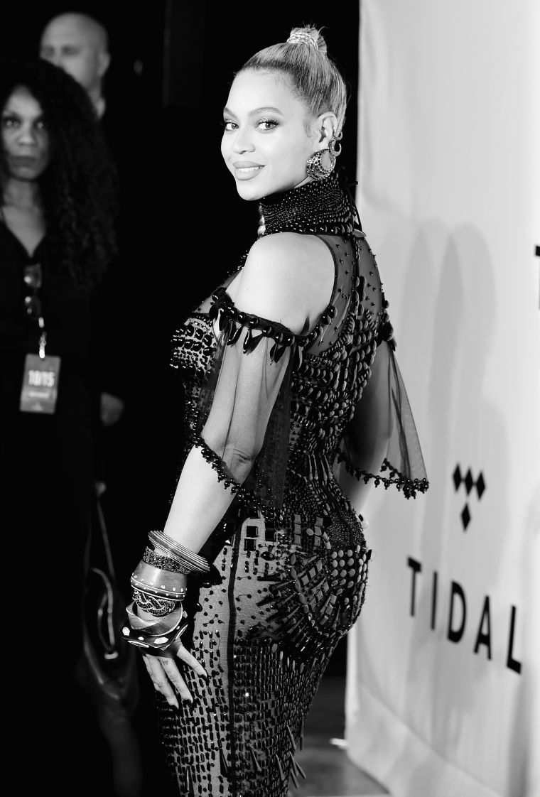 Beyoncé looks back at it.
