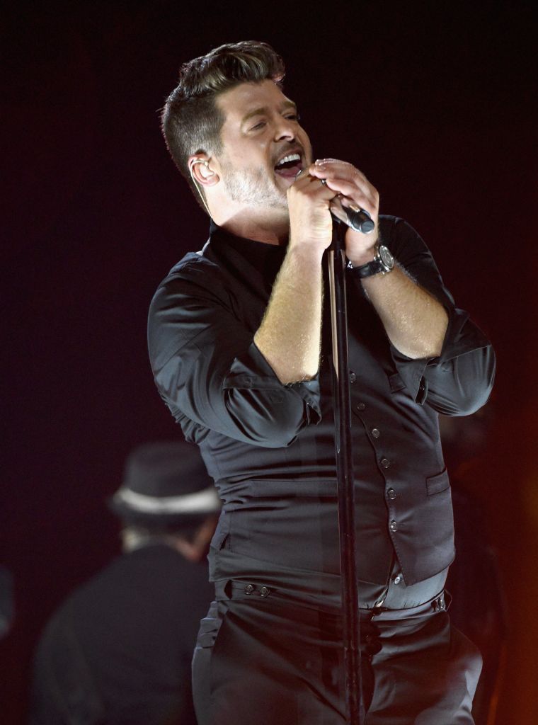 Robin Thicke sings his heart out for the benefit concert.