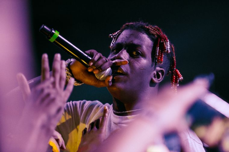 Freshman Lil Yatchy gets into the crowd to feel all the love he got while performing Broccoli at Complexcon